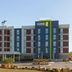 Home2 Suites by Hilton Florence hotel exterior with modern facade and parking lot