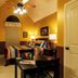 2 Cranes Inn - Zion bedroom in Rockville with colorful quilt, ceiling fan, and arched window