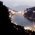 Hotel Maharaja in Nainital with a twilight lake view between lit hills