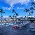 Wailea Beach Resort - Marriott, Maui pool deck with loungers, umbrellas and palm trees in Wailea