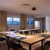 Hotel Du Port in Nogent-sur-Marne meeting room with U-shaped tables, chairs, windows and river view
