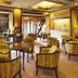 Miyako Gero Hot Spring lobby lounge with round chairs and garden view in Gero