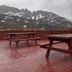 Engimyri Lodge in Akureyri with wet deck picnic tables and mountain views