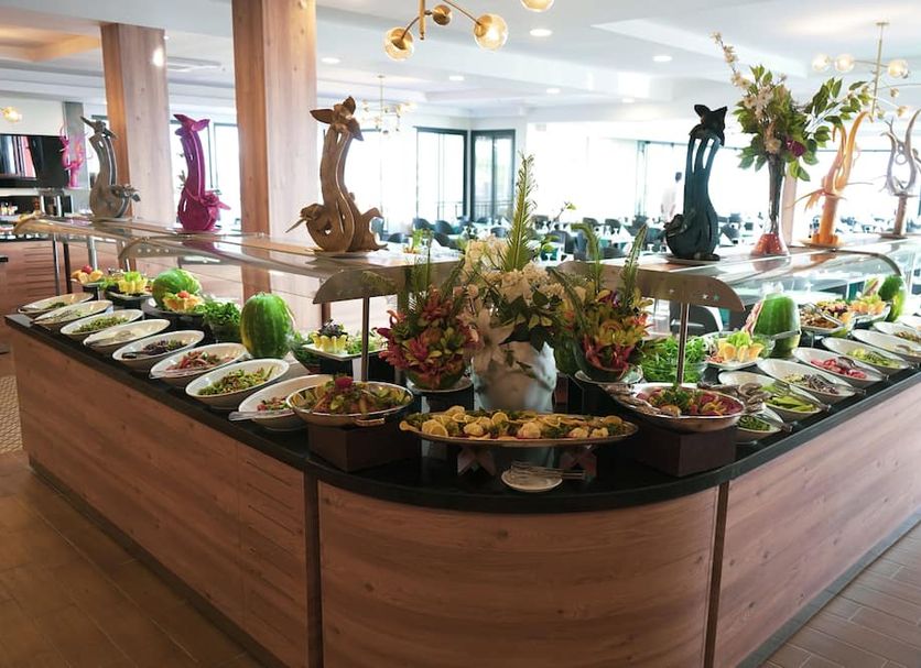 Sirma Hotel, Side: buffet spread with salads and dishes in a bright hotel dining area