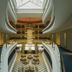 Tui Magic Life Jacaranda Side atrium with curved balconies, skylight, and central chandelier