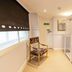 The Old Vicarage Hotel & Restaurant in Bridgwater hallway with chair and white shelving