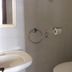 Soggiorno Burchi bathroom with sink, toilet and glass shower in Florence