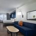 City Express by Marriott Washington, DC Northeast guest room with bed, sofa, chair and city view