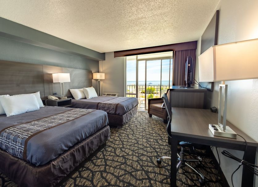 Seaview Hotel in Virginia Beach guest room with two beds and a balcony ocean view