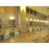 Abashiri Royal Hotel in Abashiri: tiled public bath with shower stalls and soaking tub