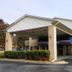 Rodeway Inn Jonesboro - Atlanta South exterior entrance with covered drive-up and landscaping