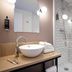 ibis Styles Lille Neuville en Ferrain bathroom with vessel sink and glass shower in Neuville-en-Ferrain