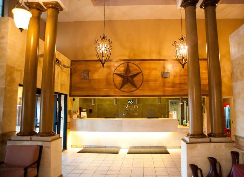 Hotel Del Valle - Austin SE by IHG lobby with reception desk and star wall decor in Austin