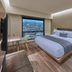 City Express Plus by Marriott Tijuana guest room with large window and city view