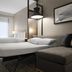 Hyatt Place Atlanta/Alpharetta/North Point Mall guest room with sofa bed and two beds in Alpharetta