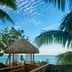 Conrad Bora Bora Nui in Vaitape with beachfront hut, palm trees, and ocean view