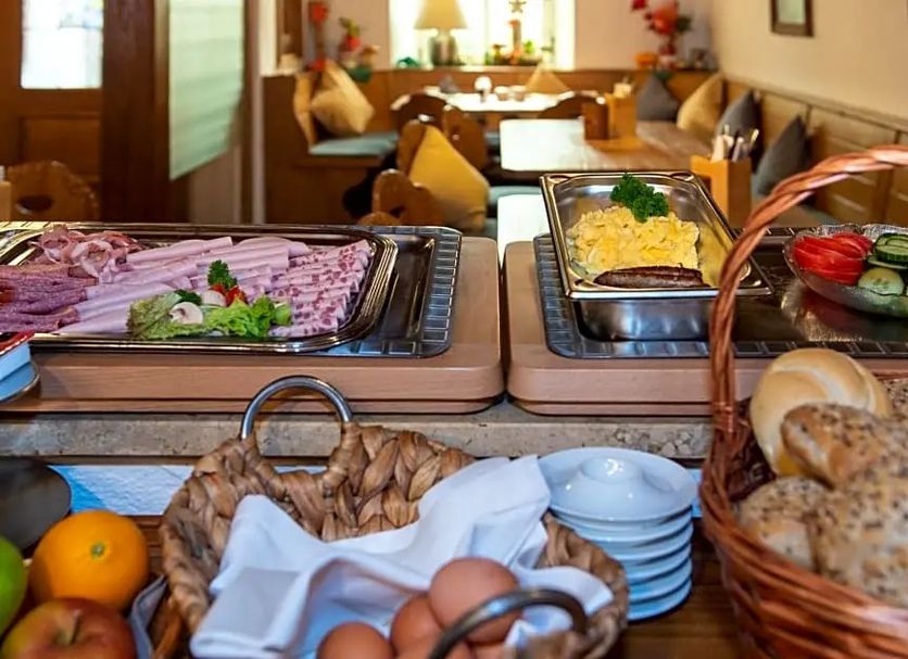 Bayerischer Hof Münnerstadt breakfast buffet with bread, eggs, fruit and cold cuts