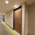 Hearton Hotel Shinsaibashi Nagahoridori in Osaka hallway with wood doors and long carpeted corridor