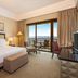 Çelik Palace Hotel Convention Center & Thermal Spa in Bursa, guest room with balcony and city view