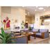 Abashiri Royal Hotel lobby with seating area, front desk, and vending machine in Abashiri