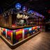 Original Sokos Hotel Vaakuna Joensuu bar with colorful mosaic-front counter and disco lights