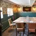The Bluebird Inn at Samlesbury in Blackburn dining room with long table and eclectic wallpaper