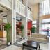 24k International Hotel People's Square lobby in Shanghai with mezzanine, seating area and front desk