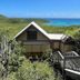 Concordia Eco Resort in St. John with hillside villas overlooking a turquoise ocean bay