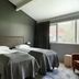 Hotel Katla by Keahotels in Vik guest room with two twin beds and a large window