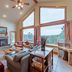 Zion Ponderosa Ranch Resort living room with large windows and mountain view in Mount Carmel