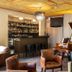 The Barn Accommodation in Mount Gambier bar lounge with grand piano and seating