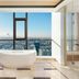 Sheraton Zibo Hotel bathroom with freestanding tub and panoramic city view in Zibo