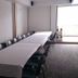 Hotel Dorado Ferial Bogotá meeting room with long conference table and chairs