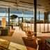 Grand Park Hotel Rovinj by Maistra Collection in Rovinj: glass-walled lounge with harbor views and wicker seating