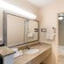 Econo Lodge Washington Nc North bathroom with granite vanity and tub-shower combo in Washington