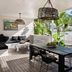 Atlantic Byron Bay outdoor terrace with dining table, lounge seating and tropical garden views in Byron Bay