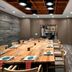 Delta Hotels by Marriott Seattle Everett meeting room with long conference table and modern fireplace