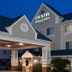 Country Inn & Suites by Radisson, Hot Springs exterior at dusk with covered entrance and lit windows