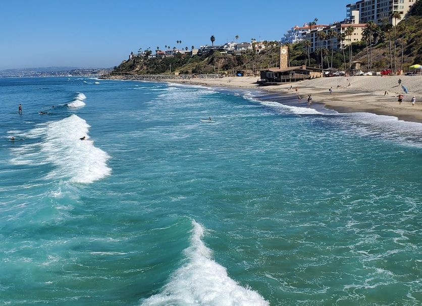Casa Tropicana in San Clemente with oceanfront beach views and waves along the shoreline