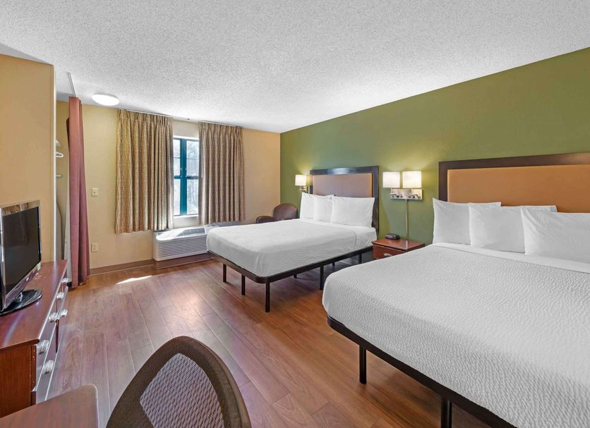 Extended Stay America Suites - Providence - Warwick room with two beds, window and wood flooring