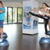 Caro Horoscop Hotel Bucharest fitness room with people balancing on BOSU balls