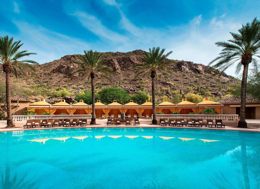 The Canyon Suites at The Phoenician, Scottsdale: outdoor pool with mountain views and palm trees