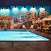 HOLLYWOOD VOLUME, a Tribute Portfolio Hotel in Los Angeles with a lit rooftop pool and mural backdrop