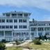 Emerson Inn By The Sea in Rockport, white seaside hotel with lawn and oceanfront view