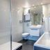 Hôtel Mercure Paris Place d'Italie bathroom with bathtub, shower, toilet and vanity in Paris