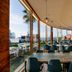 Viewtower Resort in Jeju City dining area with floor-to-ceiling windows and ocean views