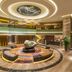DoubleTree by Hilton Guangzhou - Science City lobby with circular chandelier and central sculpture in Guangzhou