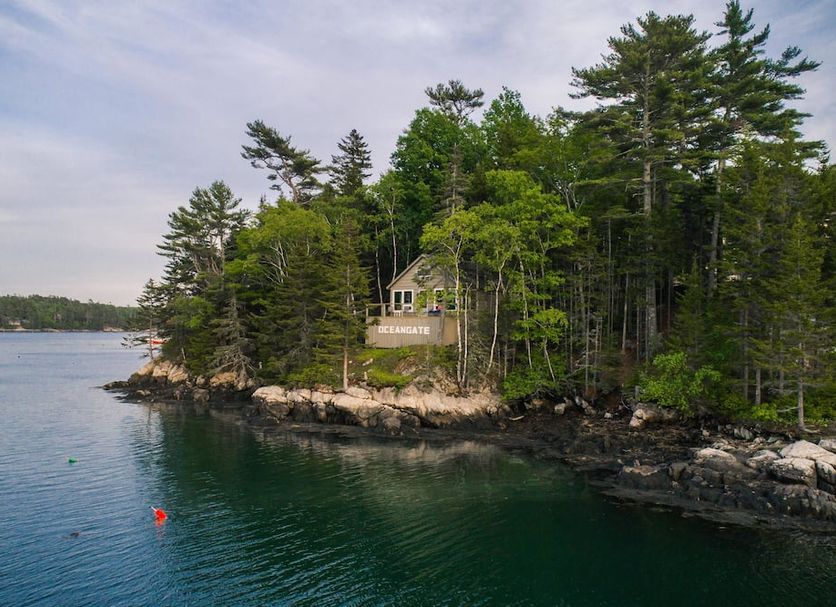 Ocean Gate Resort in Southport on a wooded waterfront cliff with calm bay views