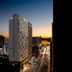 Fairfield by Marriott Busan high-rise city view at dusk with illuminated streets and sunset skyline