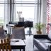 Aiden by Best Western Haugesund Airport lounge with grand piano, seating, and large windows in Avaldsnes